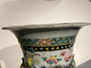 A Chinese relief-moulded famille rose 'antiquities' vase, 19th C.